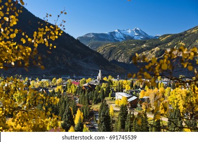 Fall foliage and snow capped mountains make a beautiful scene in Silverton, Colorado. 