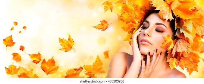 Fall Girl - Beauty Model Woman With Orange Autumn Leaves Hairstyle
