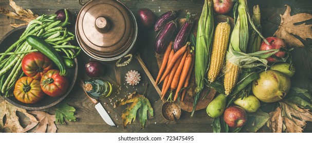 Fall Healthy Cooking Background. Ingredients For Thanksgiving Day Dinner. Flat-lay Of Beans, Corn Corn, Carrot, Tomatoes, Eggplants, Fruits And Fallen Leaves Over Wooden Table, Top View