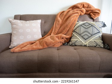 Fall Interior Design Couch With Throw Pillows With Pumpkin And Orange Throw Blanket On Love Seat