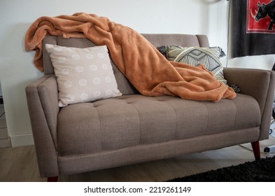 Fall Interior Design Couch With Throw Pillows With Pumpkin And Orange Throw Blanket On Love Seat