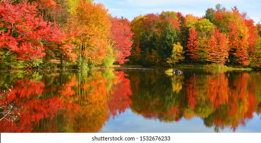 Fall landscape reflection Quebec province Canada