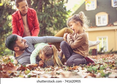 Fall leaves is great for family fun. 