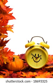 Fall Leaves With Yellow Clock And Pumpkin On White Background, Fall Back Time Change