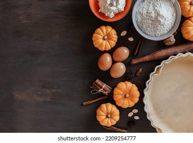 Fall Pie Baking Ingredients With Pumpkins, Nuts, Seasonal Spices And Tools. Pumpkin Pie Recipe Idea. Thanksgiving And Autumn Holidays Celebration Concept. Top View, Flatlay