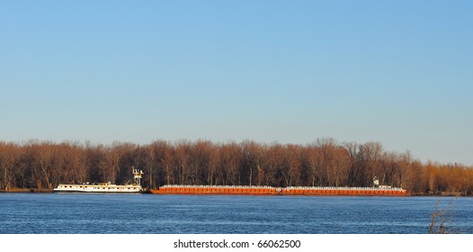 Fall River Scene Over The Mississippi River Iowa With Barge Going Up River