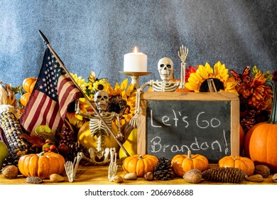 Fall Scene With Skeleton Holding Lets Go Brandon Sign And American Flag