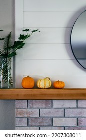 Fall Season Home Decor Pumpkins On Fire Place Mantle With Ship Lap Round Mirror