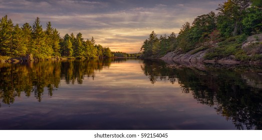 Fall Sunset At The Kawartha Highlands Provincial Park
Bass Fishing From A Canoe On Wolf Lake, Ontario, Canada