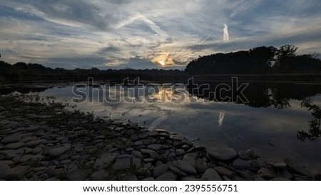 Fall sunset over a rocky beach in Rattray Marsh Southern Ontario