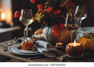 Fall table decoration with pumpkins, wine. Family cozy thanksgiving dinner arrangement indoors at home, wedding elegant decor. Countryside style, simple handmade setting, autumn mood, inspiration. - Powered by Shutterstock