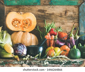 Fall Vegetarian Food Ingredient Variety. Assortment Of Various Autumn Vegetables For Healthy Cooking Over Rustic Cupboard, Wooden Tray Background. Local Market Organic Produce