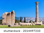 Fallen columns of Temple of Olympian Zeus, Athens, Greece. Ancient building of Zeus or Olympieion is famous landmark of city. Classical Greek ruins, monument of culture and history of old Athens.