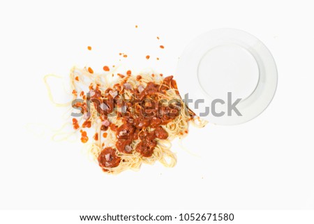 A fallen dish of pasta on the floor