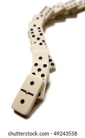 Fallen Dominoes Over White Background