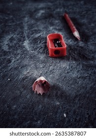  fallen Pensil and sharpner on ground. school days click