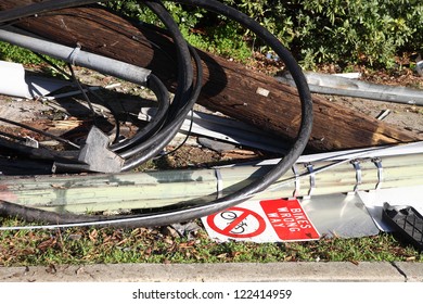 fallen utility equipment and bicycle sign following a one-car accident