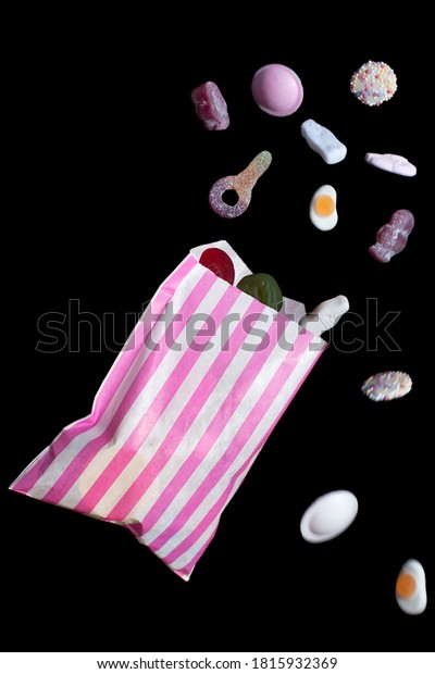 Falling bag of pick n mix\
sweets