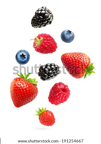 Falling berries isolated on white background