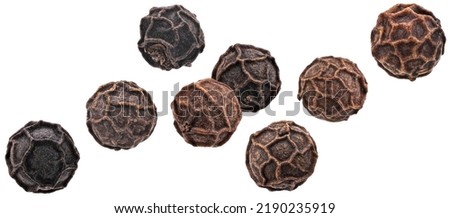 Falling black pepper isolated on white background 