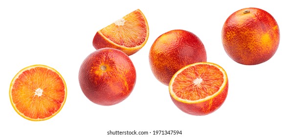 Falling blood red orange fruits isolated on white background with clipping path