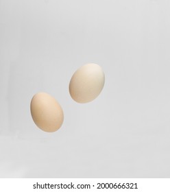Falling chicken eggs. Levitation. Floating in the air - Shutterstock ID 2000666321