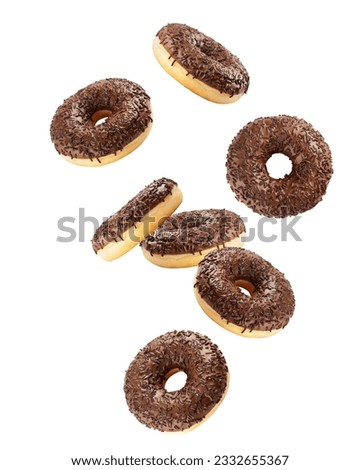 Falling chocolate Donut isolated on white background, clipping path, full depth of field