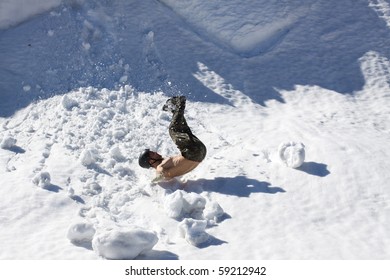 Falling climber backpacker from the snow wall.