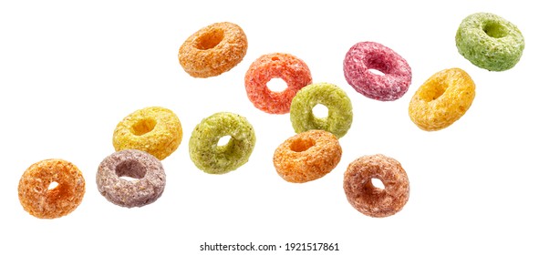 Falling colorful corn rings isolated on white background with clipping path