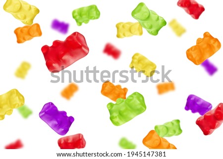 Falling Colorful jelly gummy bear, isolated on white background, selective focus