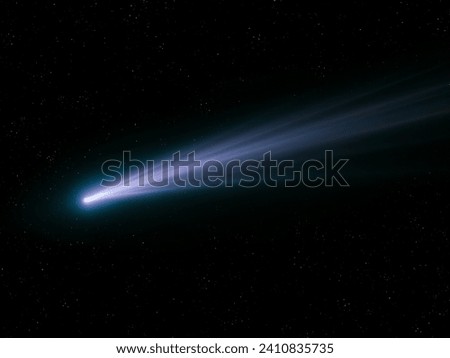 Falling comet. Glowing tail of a comet. Astronomical object. Bright celestial body.