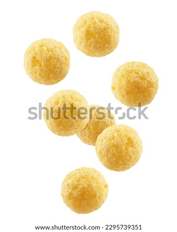 Falling corn ball, isolated on white background, clipping path, full depth of field