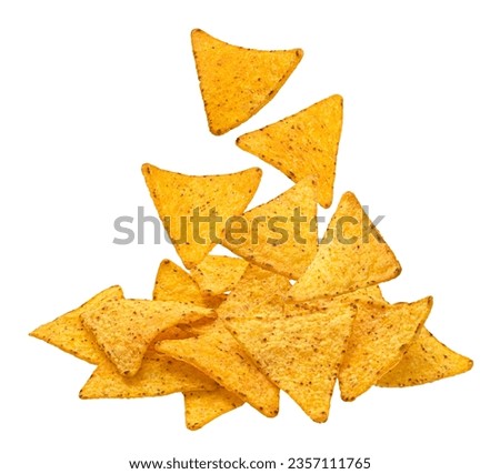 Falling corn chips, hot mexican nachos isolated on white background 