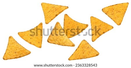 Falling corn chips, hot mexican nachos isolated on white background 