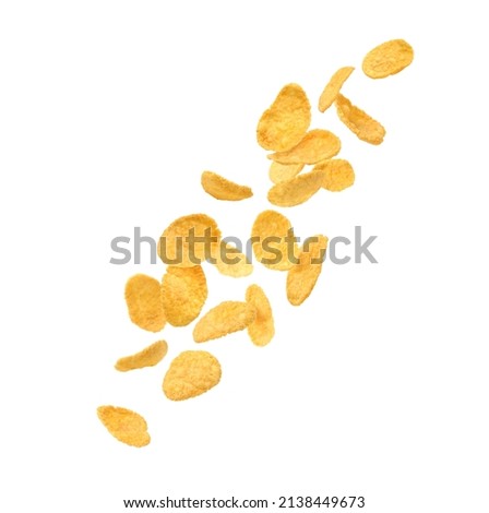 Falling corn flakes isolated on white background.