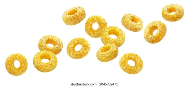 Falling corn rings isolated on white background