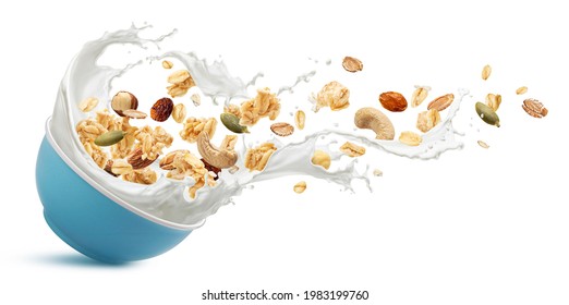 Falling crunchy muesli, bowl of oat granola with milk splashing isolated on white background