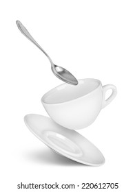 Falling Cup With Saucer And Spoon On Isolated White Background