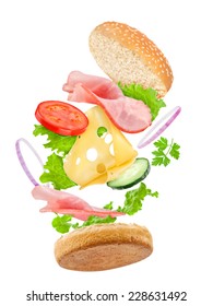 Falling Delicious Sandwich With Ingredients: Ham, Cheese, Tomato, Cucumber, Onion, Lettuce