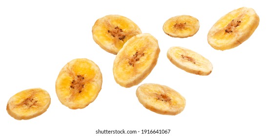 Falling dried banana slices isolated on white background with clipping path