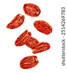 Falling dried Tomato isolated on white background, clipping path, full depth of field