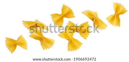 Falling farfalle pasta isolated on white background with clipping path