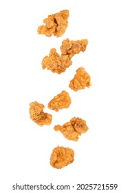 Falling of fried popcorn chicken isolated on white background.