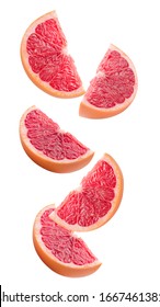 falling grapefruit slices isolated on a white background