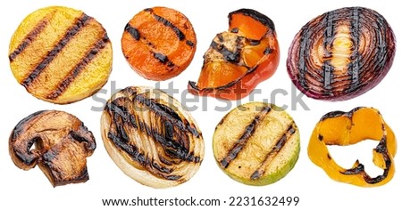 Falling grilled vegetable slices isolated on white background