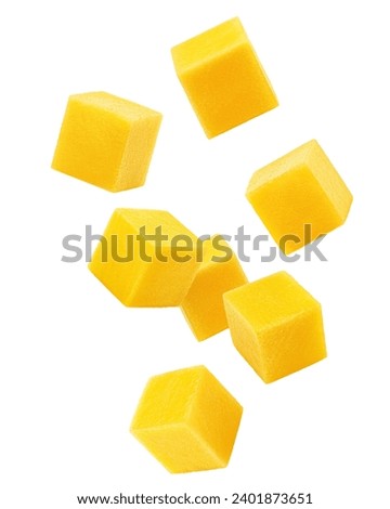 Falling Mango cube isolated on white background, full depth of field