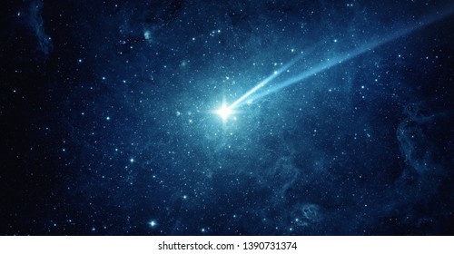 Falling meteorite, asteroid, comet in the starry sky. Elements of this image furnished by NASA. 