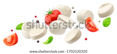 Falling mozzarella cheese isolated on white background with clipping path, caprese salad ingredients