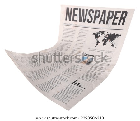 Falling newspaper on white background