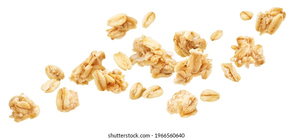 Falling oat granola, crunchy muesli isolated on white background - Shutterstock ID 1966560640